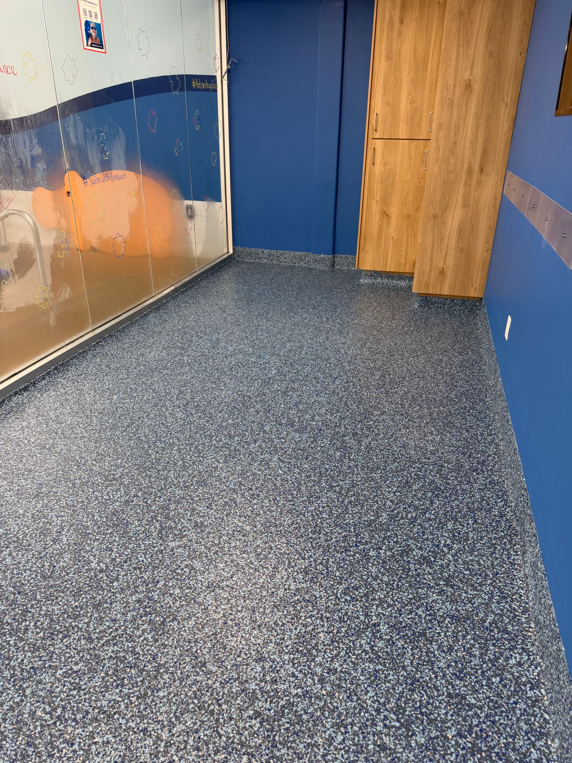 Gallery photos for Flake Epoxy Flooring Across Every Corner of a Swim School: Image #3