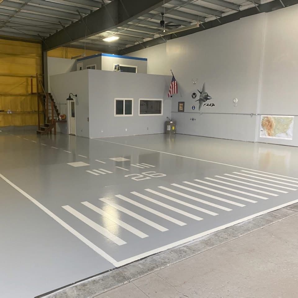Gallery photos for Custom Runway-Themed Epoxy Floor in a Private Hangar: Image #1