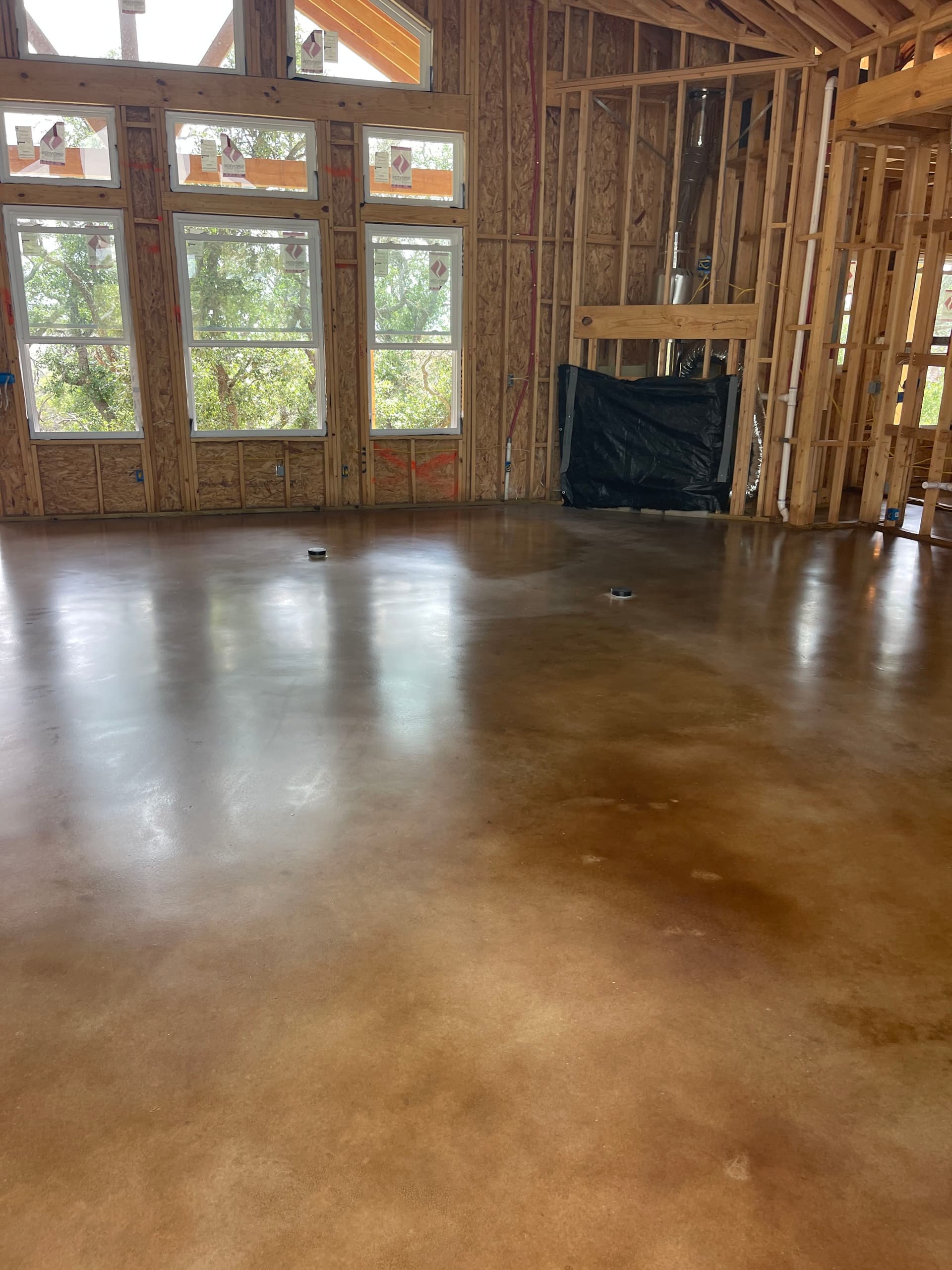 Half-and-Half Stained Concrete Floors for a Hickory New Build image