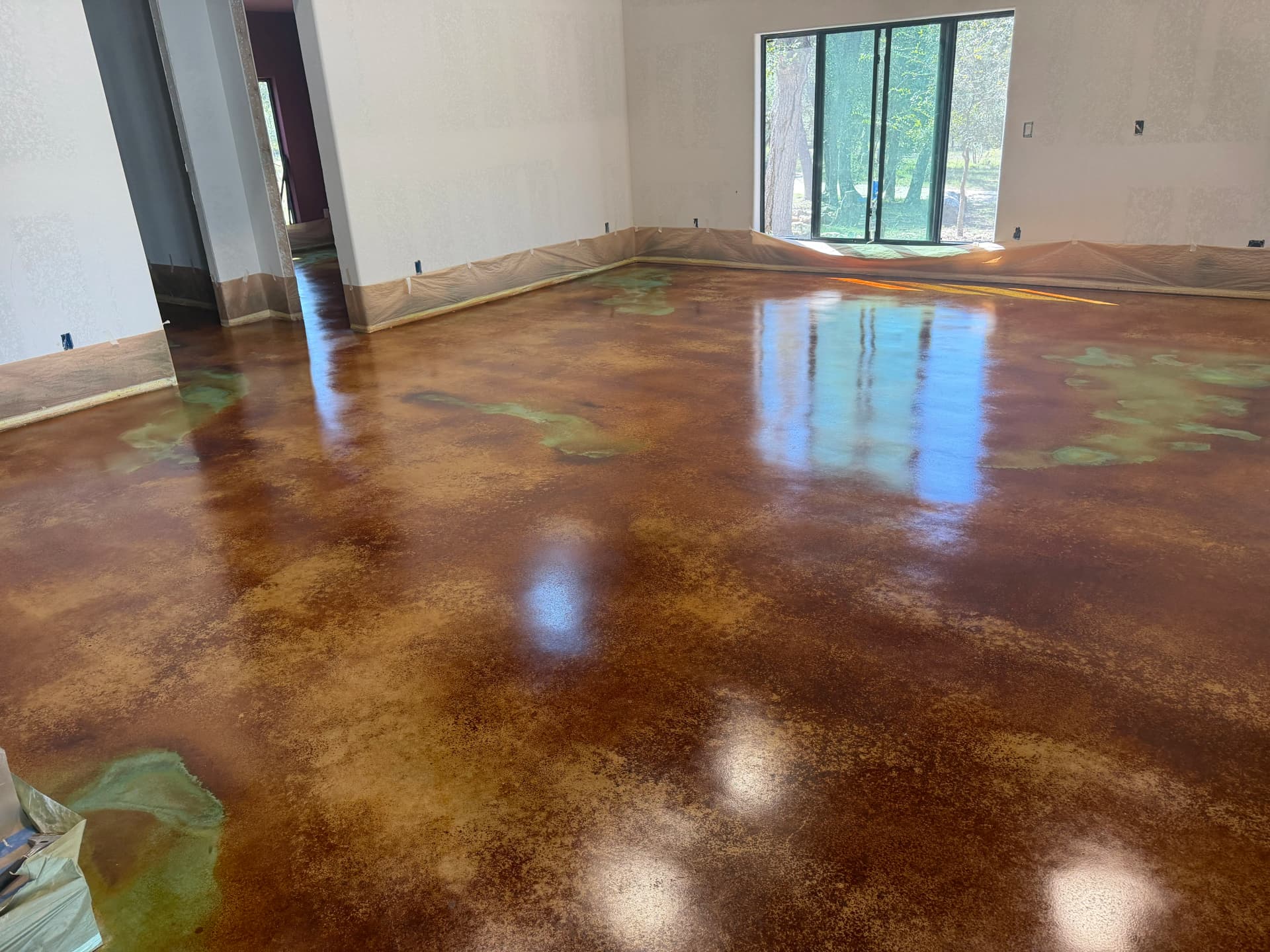 Gallery photos for Acid Stained Concrete Floor with Aqua and Cola Colors: Image #1