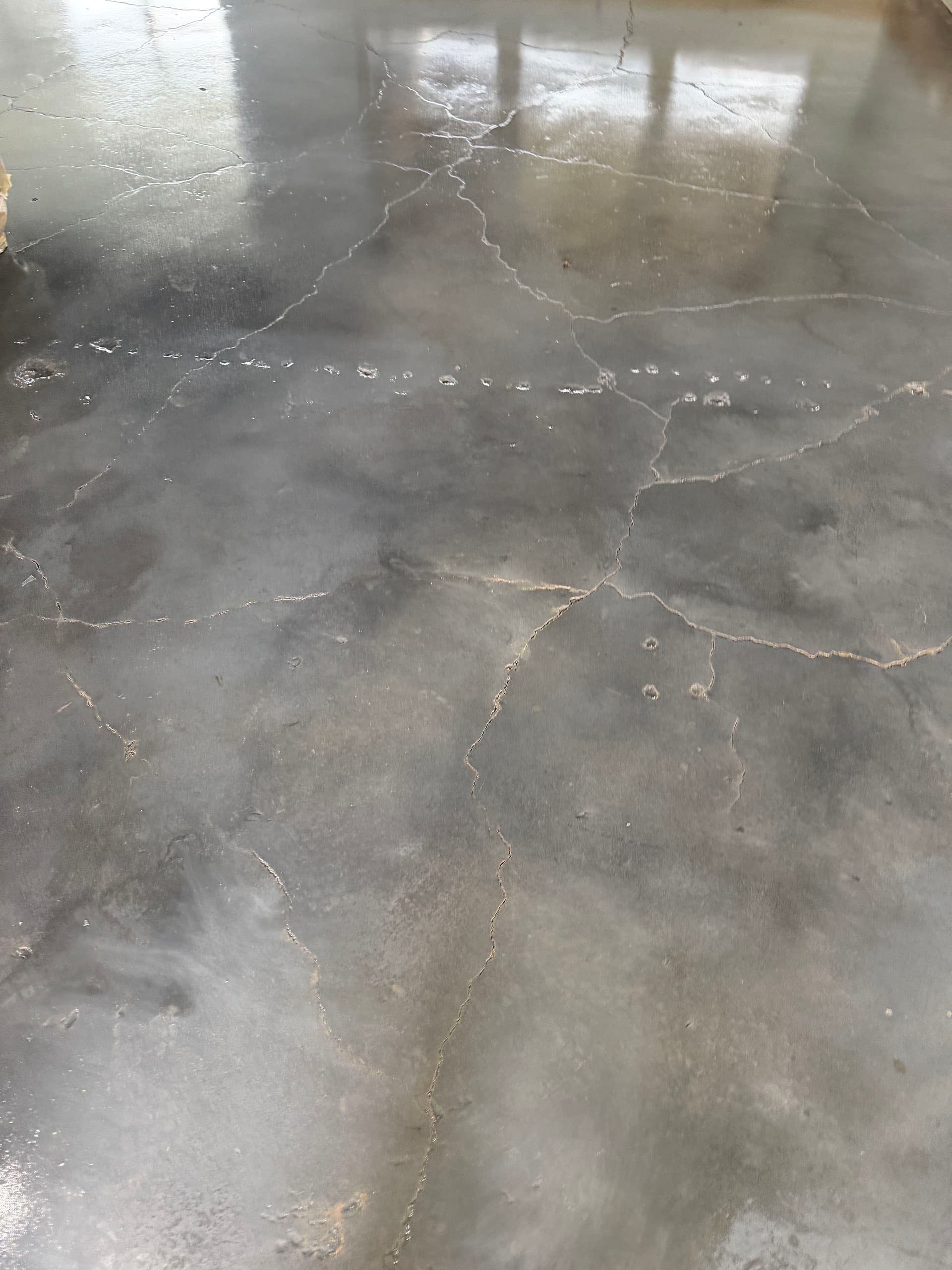 Gallery photos for Custom Grey Stained Concrete Floor Built for Heavy Traffic: Image #1