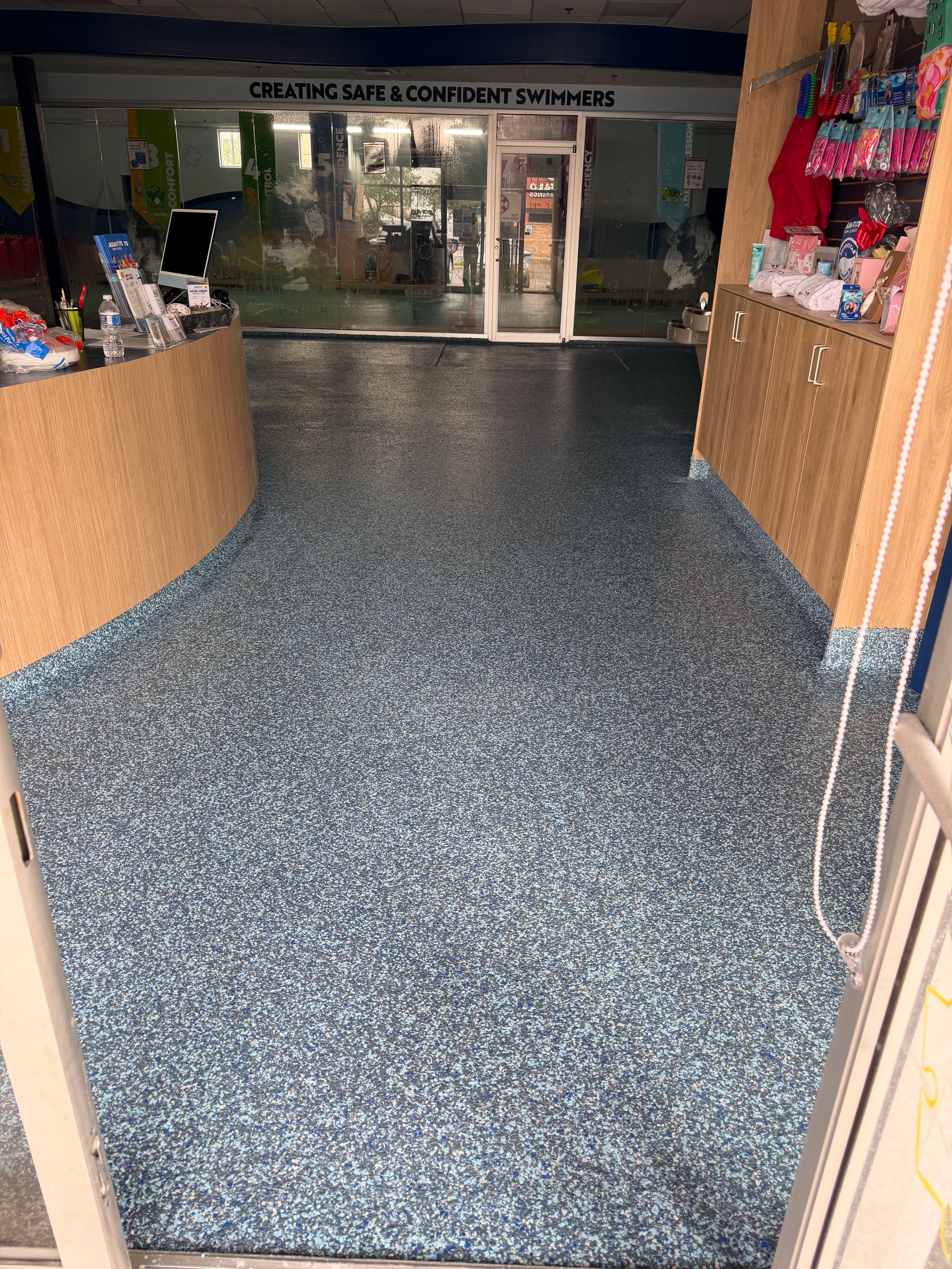 Project Flake Epoxy Flooring Across Every Corner of a Swim School image