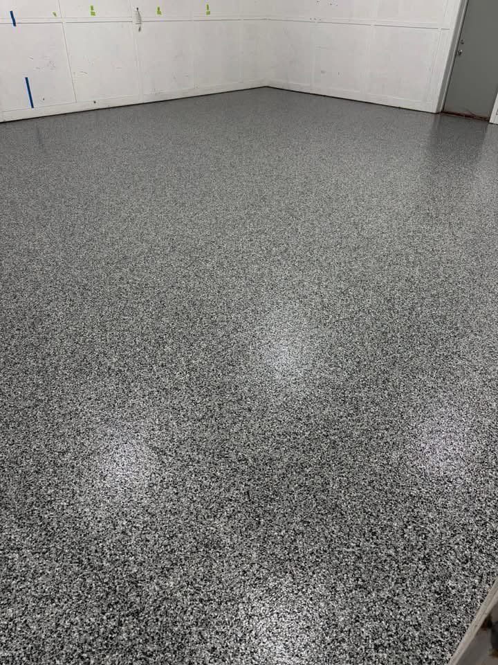 Project Glossy Epoxy Flooring for Enhanced Garage Spaces image