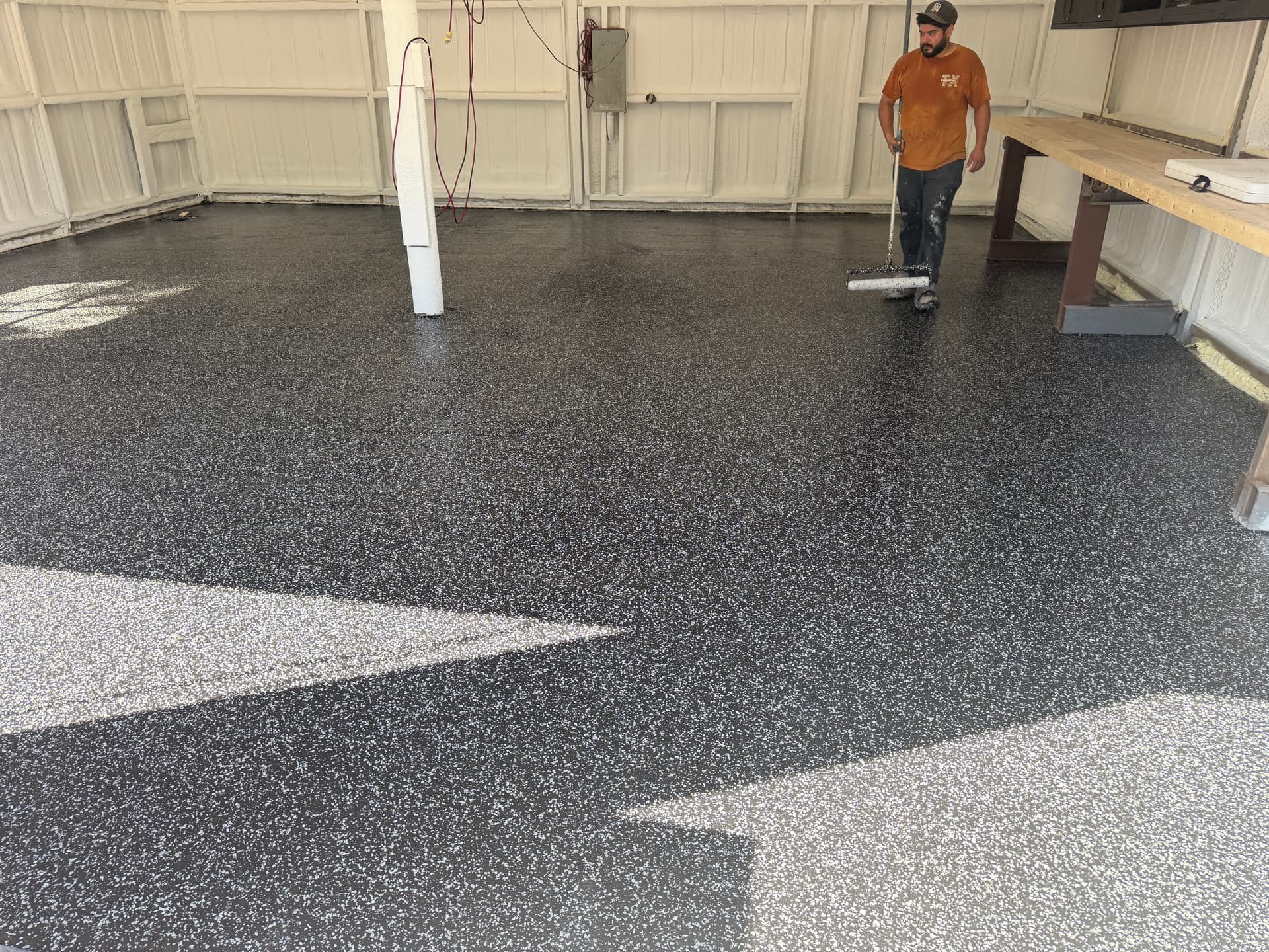 Gallery photos for Rough Concrete Slab Gets a Raven Flake Epoxy Finish: Image #3