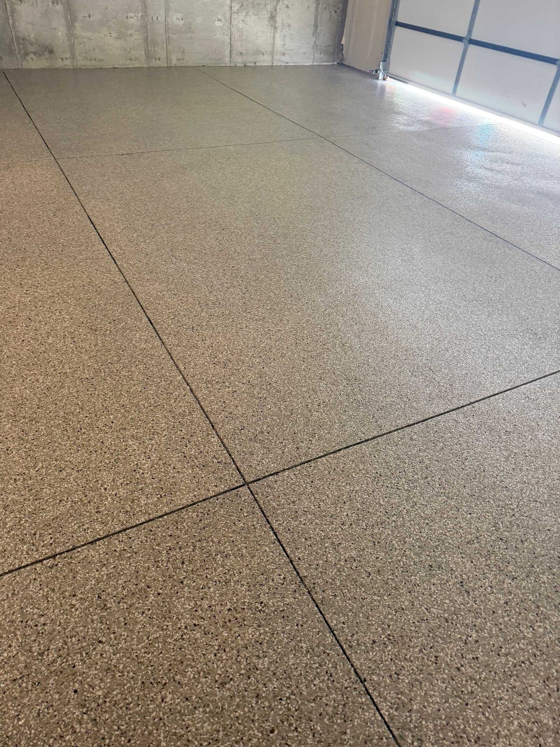 Gallery photos for Creekbed Flake Epoxy Gives This Garage Floor a Sharp Finish: Image #2