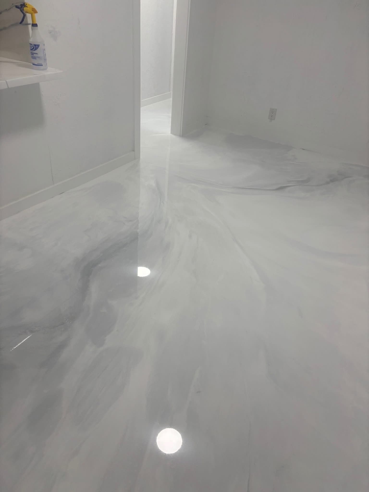 Gallery photos for Subtle Metallic Epoxy Floor That Looks Like Polished Marble: Image #1
