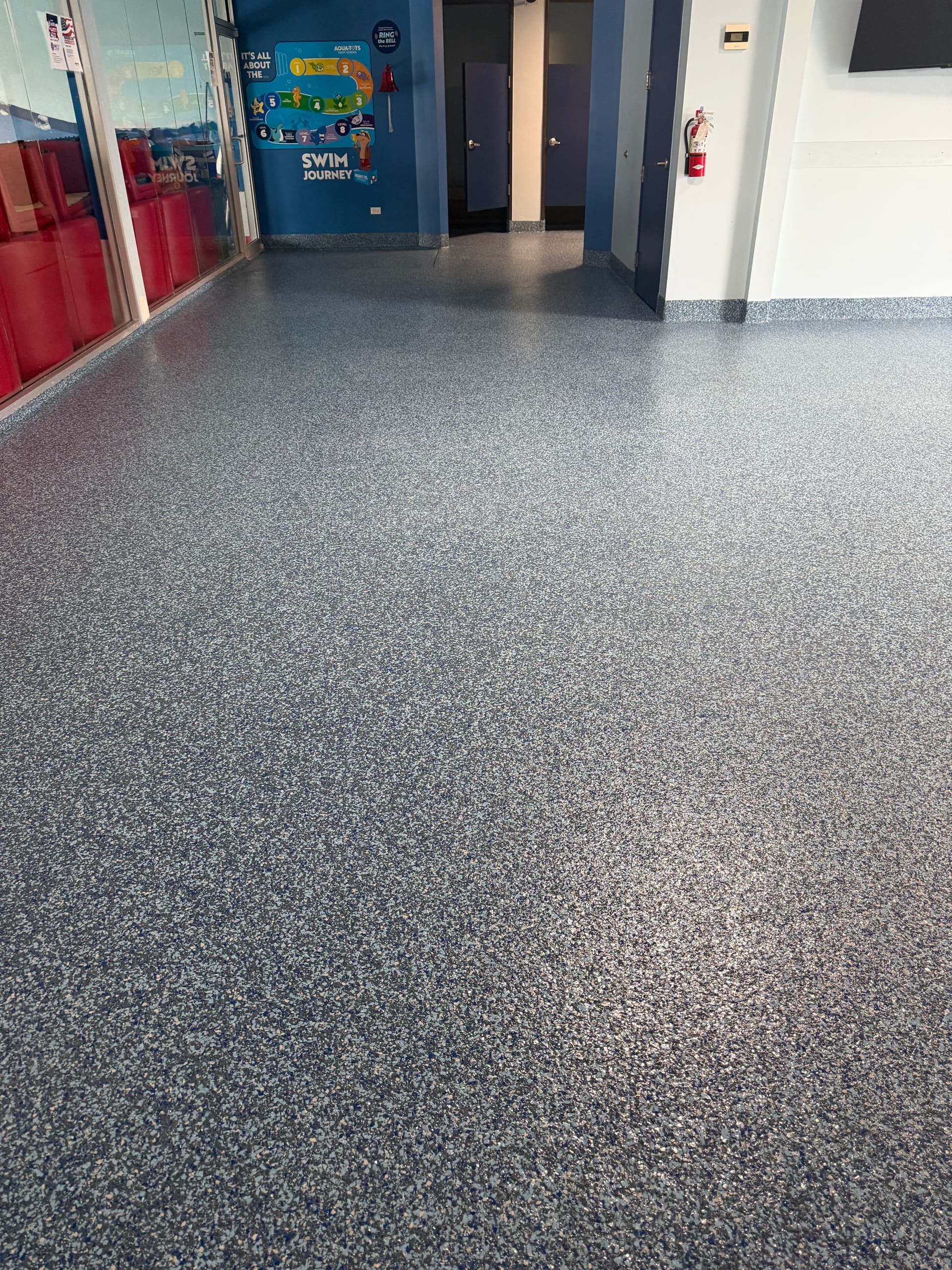 Flake Epoxy Flooring Built for a Busy Swim School image
