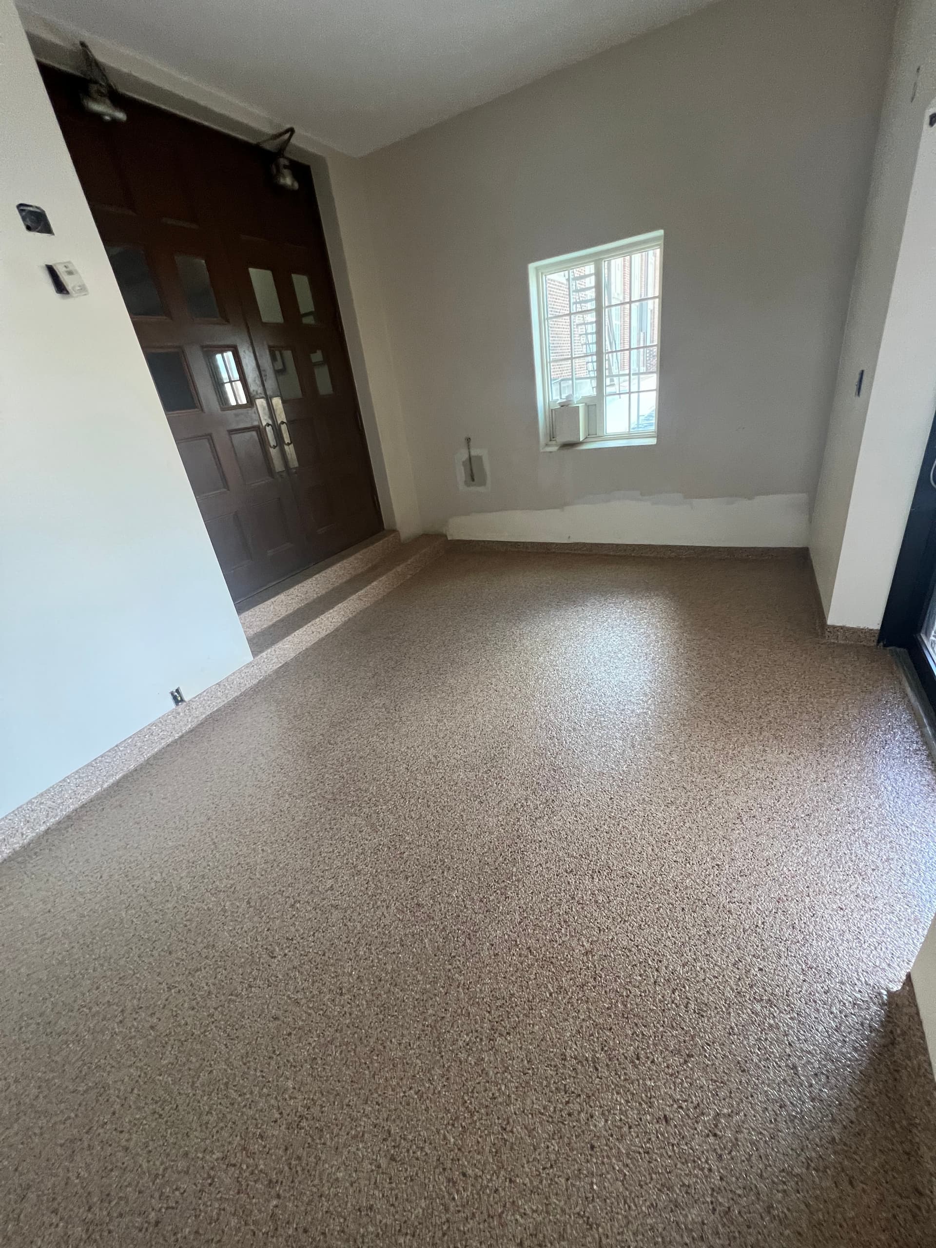 Gallery photos for Flake Epoxy Flooring Built for a Hardworking Mud Room: Image #1