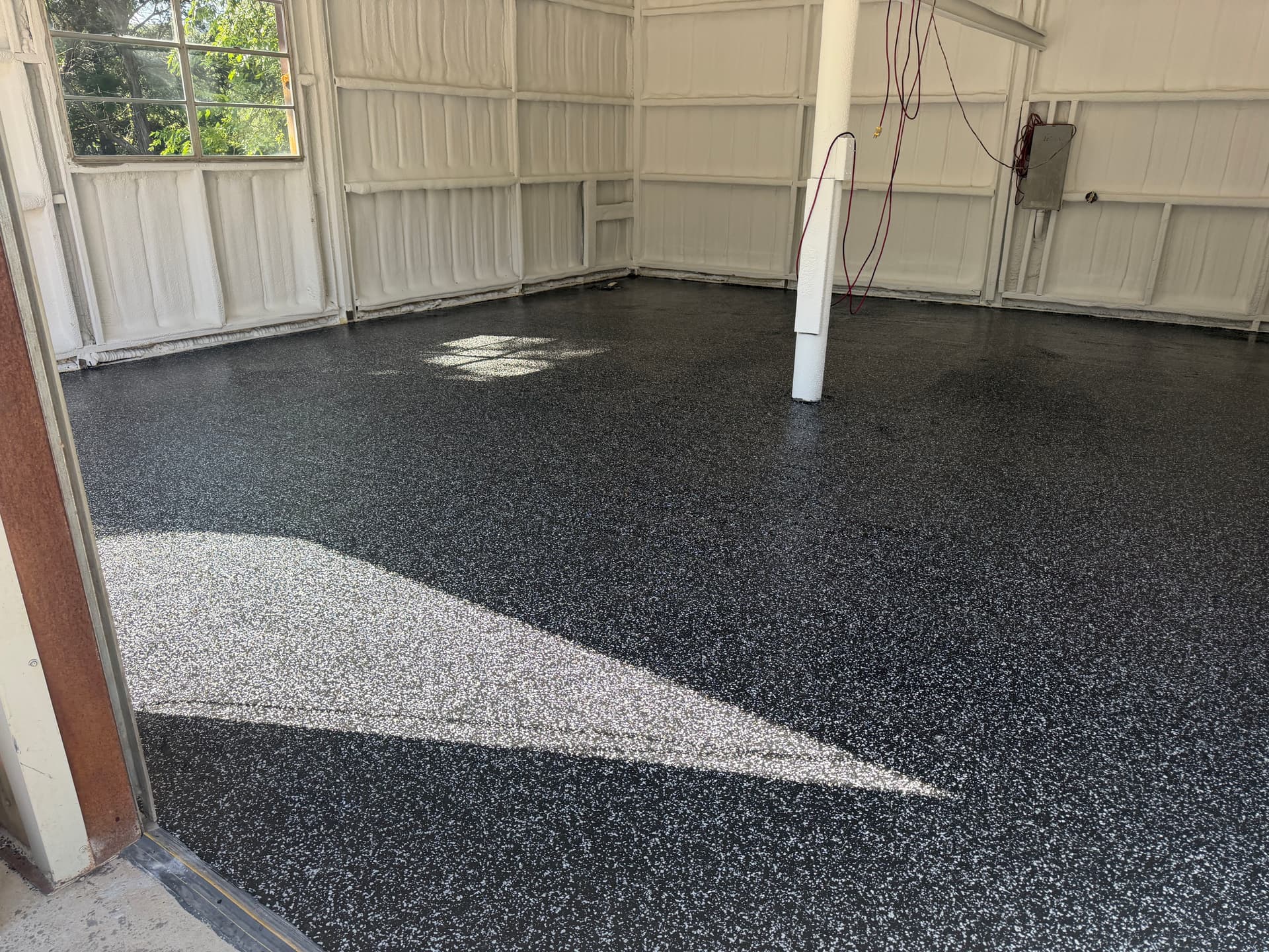 Gallery photos for Rough Concrete Slab Gets a Raven Flake Epoxy Finish: Image #4