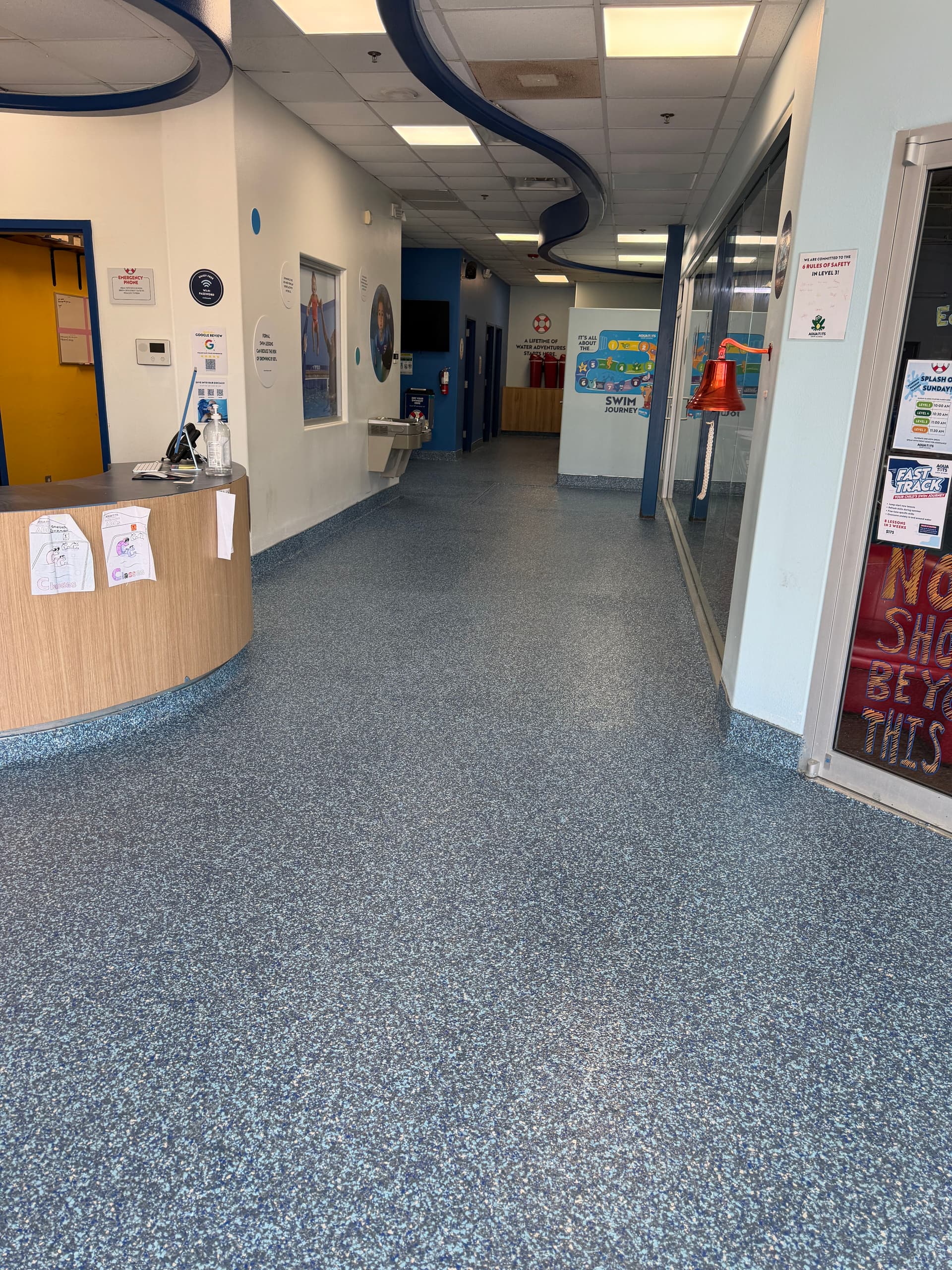 Gallery photos for Flake Epoxy Flooring with Cove Base at Aqua-Tots Swim School: Image #4