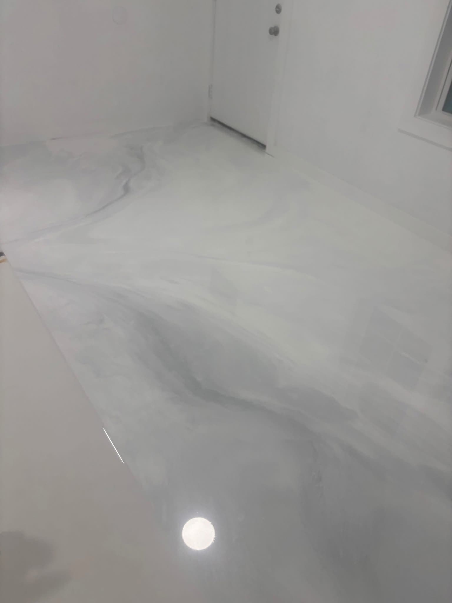 Gallery photos for Subtle Metallic Epoxy Floor That Looks Like Polished Marble: Image #2