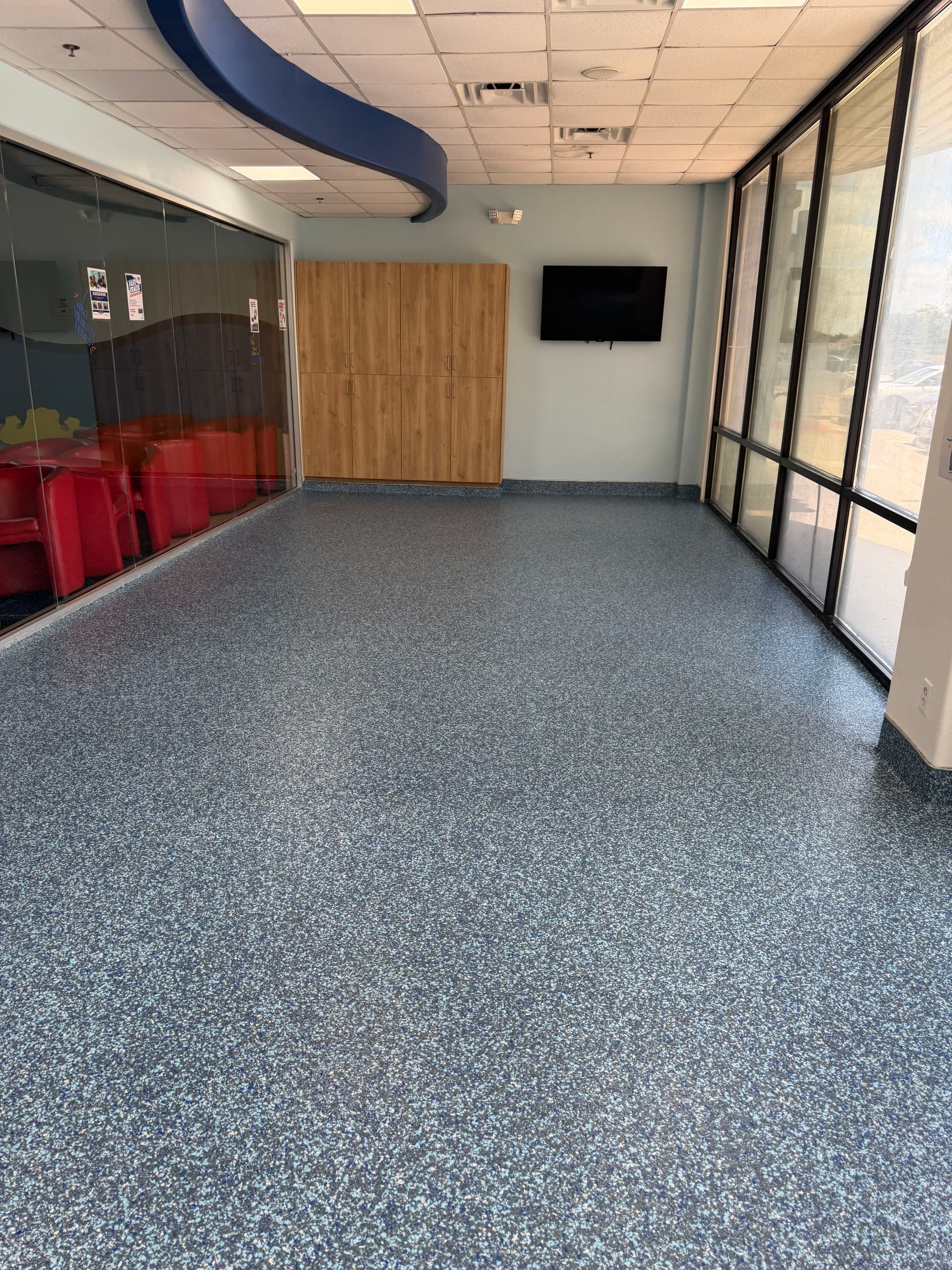 Gallery photos for Flake Epoxy Flooring with Cove Base at Aqua-Tots Swim School: Image #2