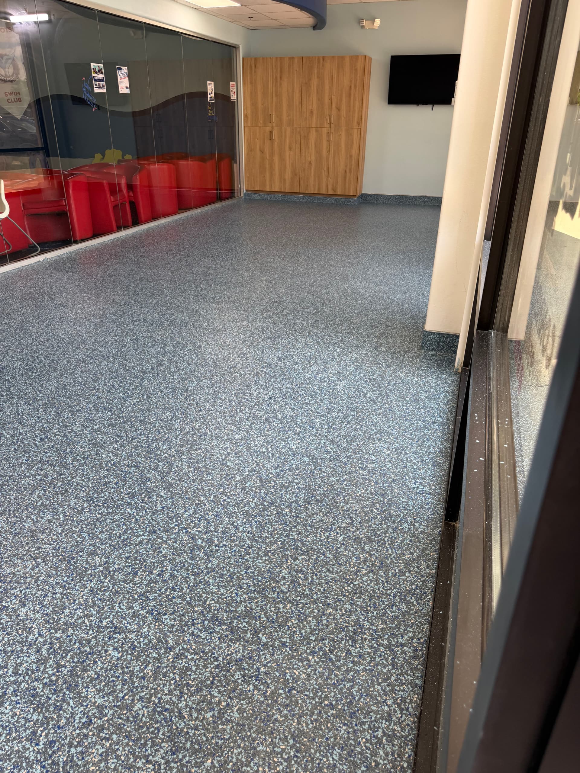 Flake Epoxy Flooring with Cove Base at Aqua-Tots Swim School image
