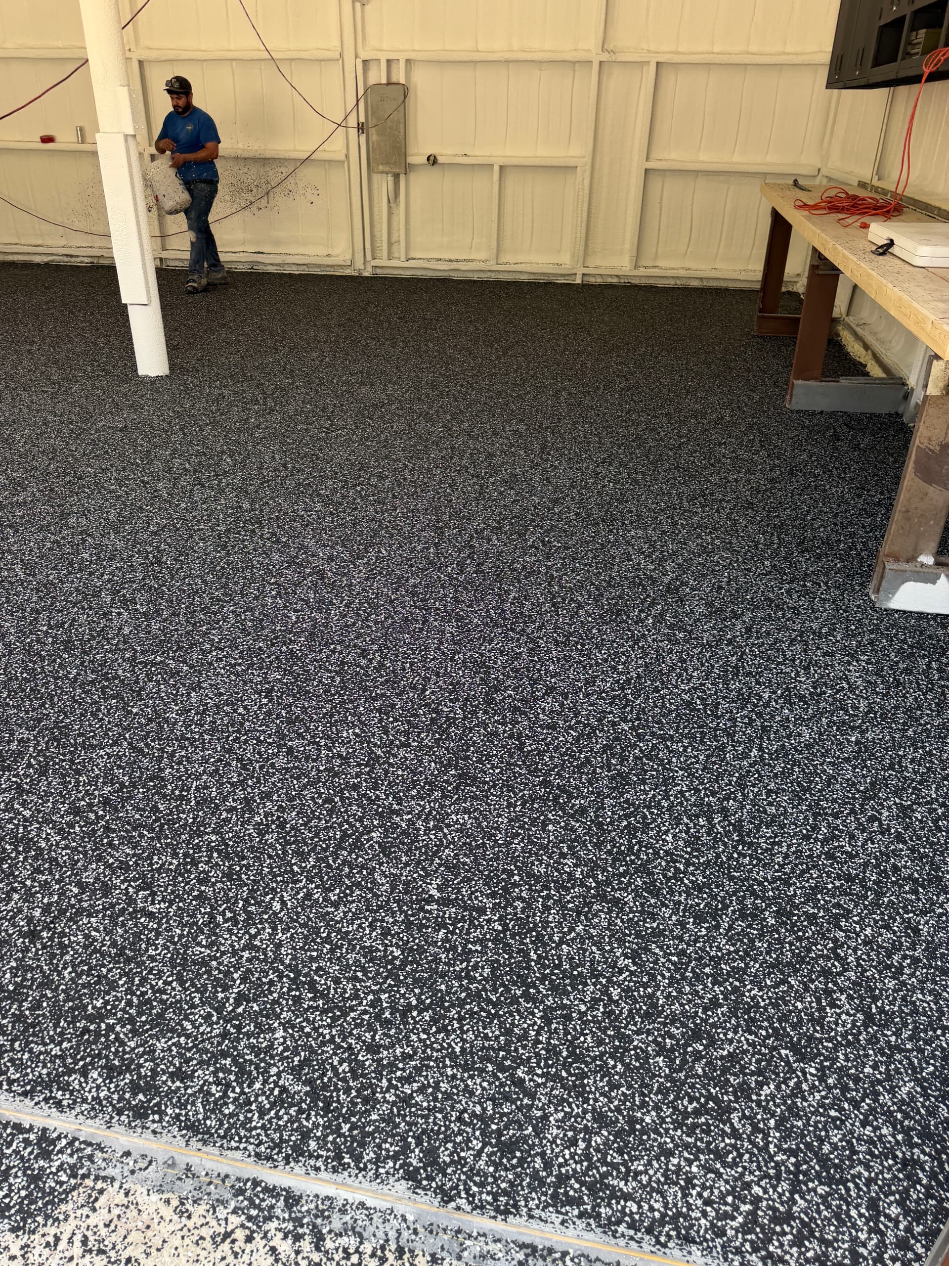 Gallery photos for Rough Concrete Slab Gets a Raven Flake Epoxy Finish: Image #2